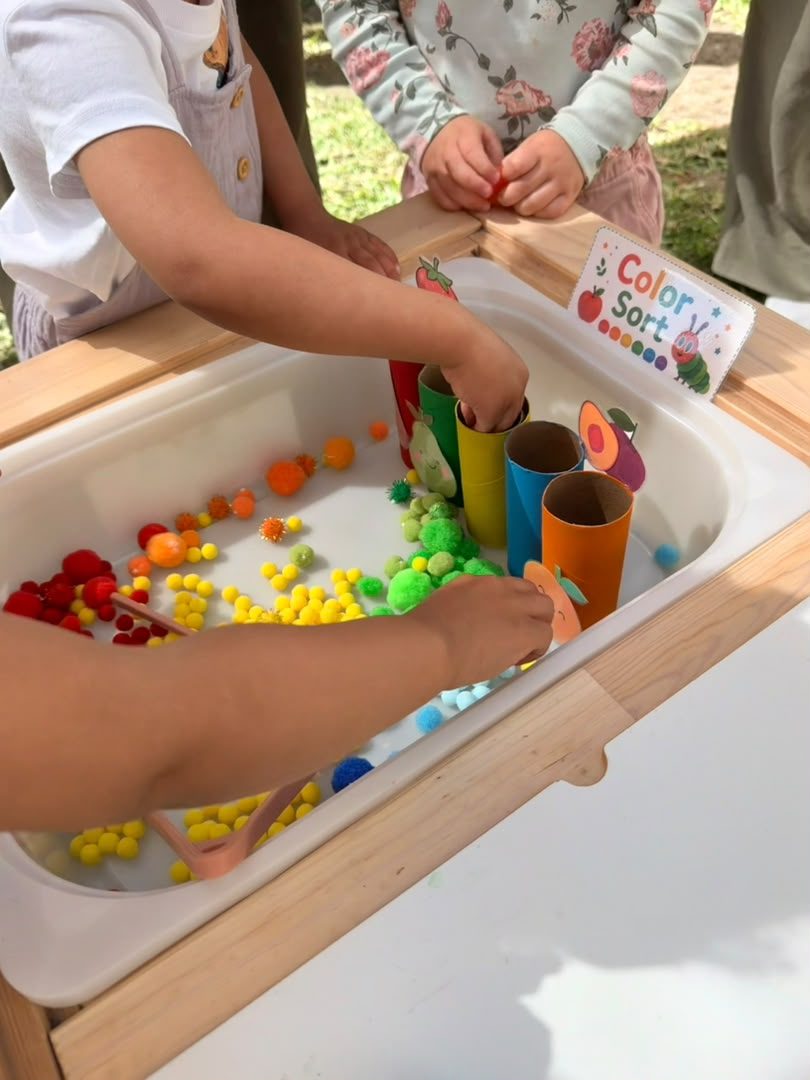 Kids doing a colour sort activity